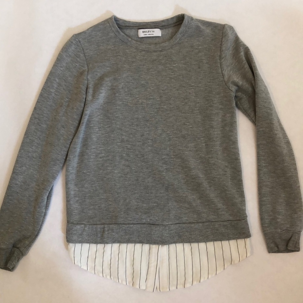 Grey sweater with bottom detail
